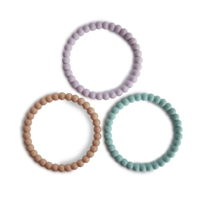 Silikonowy gryzak bransoletka - Licac, Cyan, Soft peach, Mushie